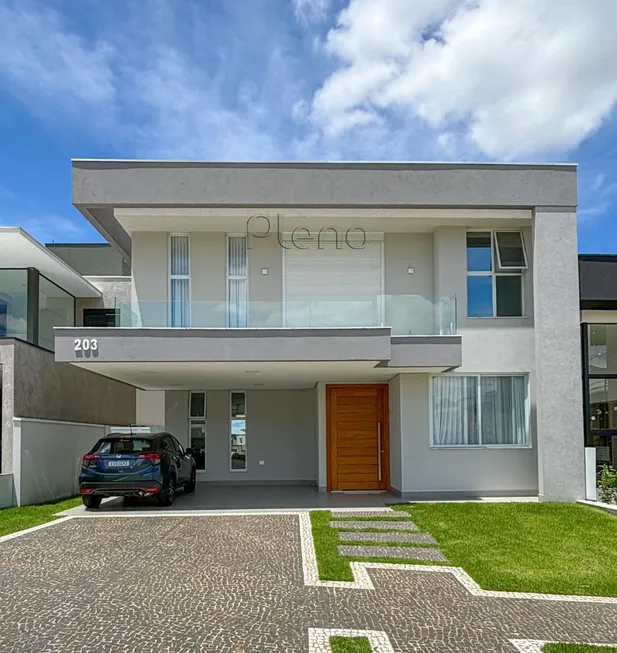 Foto 1 de Casa de Condomínio com 5 Quartos para venda ou aluguel, 360m² em Swiss Park, Campinas