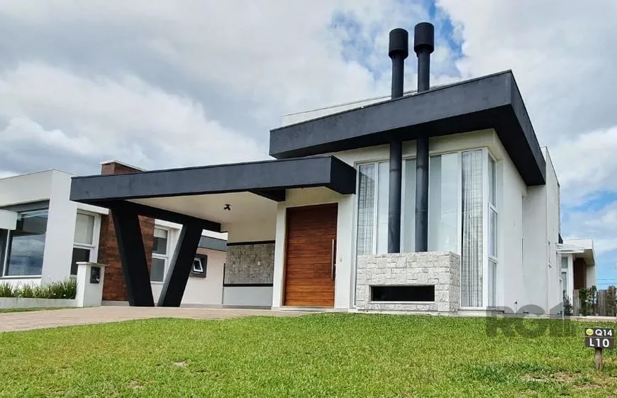 Foto 1 de Casa de Condomínio com 3 Quartos à venda, 160m² em Capao da Canoa, Capão da Canoa