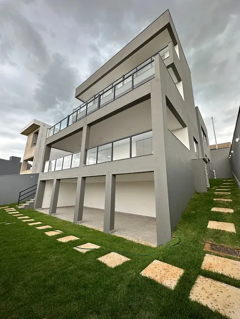 Foto 1 de Casa com 4 Quartos à venda, 465m² em Alphaville, Vespasiano