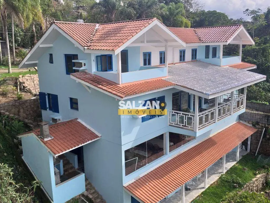 Foto 1 de Casa com 5 Quartos à venda, 420m² em Praia das Toninhas, Ubatuba