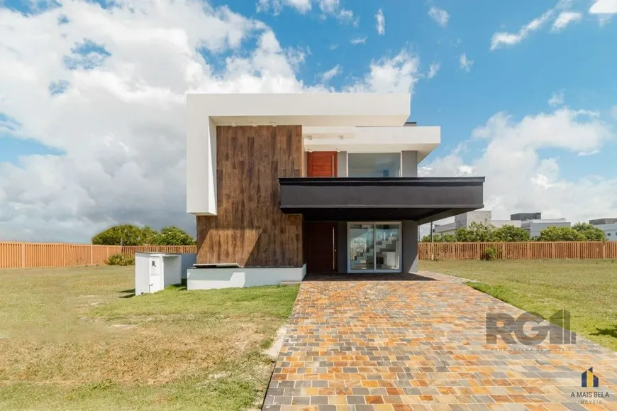 Foto 1 de Casa de Condomínio com 5 Quartos à venda, 292m² em Praia da Cal, Torres