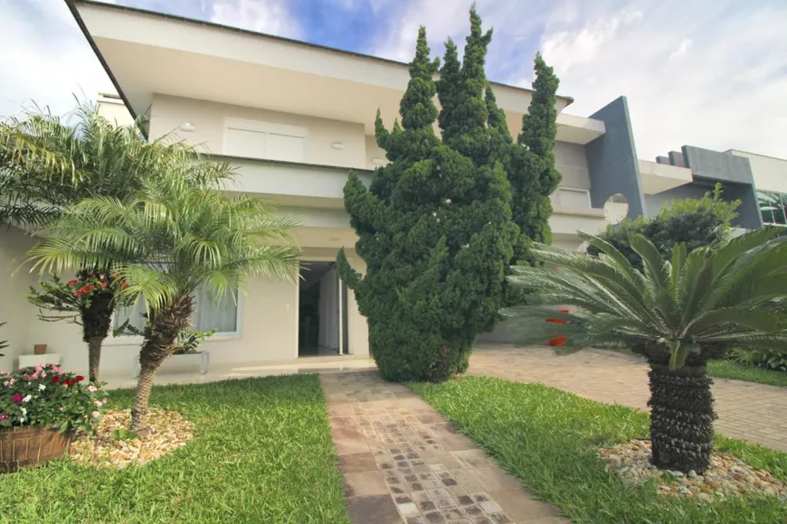 Foto 1 de Casa de Condomínio com 5 Quartos à venda, 280m² em Condominio Condado de Capao, Capão da Canoa