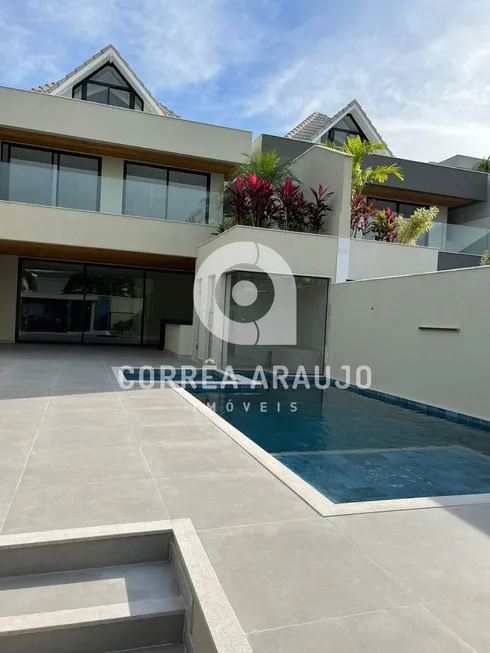 Foto 1 de Casa com 4 Quartos à venda, 420m² em Barra da Tijuca, Rio de Janeiro