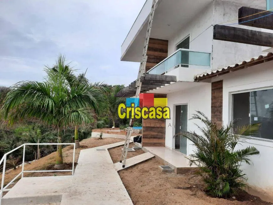 Foto 1 de Casa de Condomínio com 3 Quartos à venda, 74m² em Peró, Cabo Frio