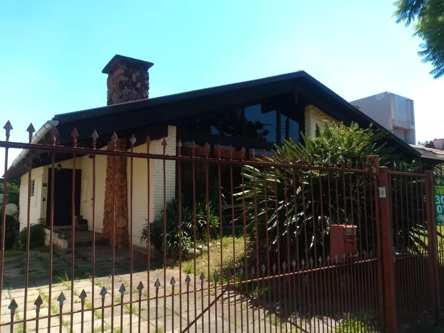 Foto 1 de Casa com 3 Quartos à venda, 280m² em Três Figueiras, Porto Alegre