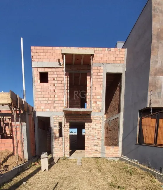 Foto 1 de Sobrado com 3 Quartos à venda, 73m² em Aberta dos Morros, Porto Alegre