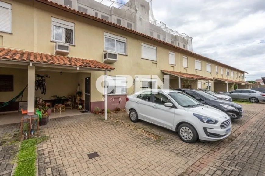 Foto 1 de Casa de Condomínio com 3 Quartos à venda, 100m² em Harmonia, Canoas