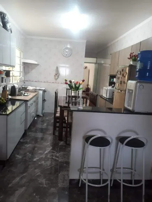 Foto 1 de Casa com 2 Quartos à venda, 154m² em Vila Suica, Santo André