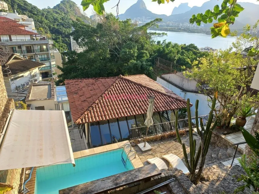 Foto 1 de Casa com 4 Quartos à venda, 354m² em Lagoa, Rio de Janeiro