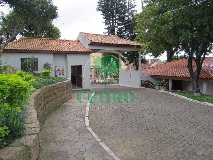 Foto 1 de Casa de Condomínio com 4 Quartos à venda, 250m² em Santo Antônio, Porto Alegre