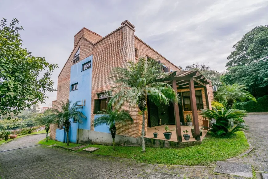 Foto 1 de Casa de Condomínio com 3 Quartos à venda, 142m² em Cavalhada, Porto Alegre