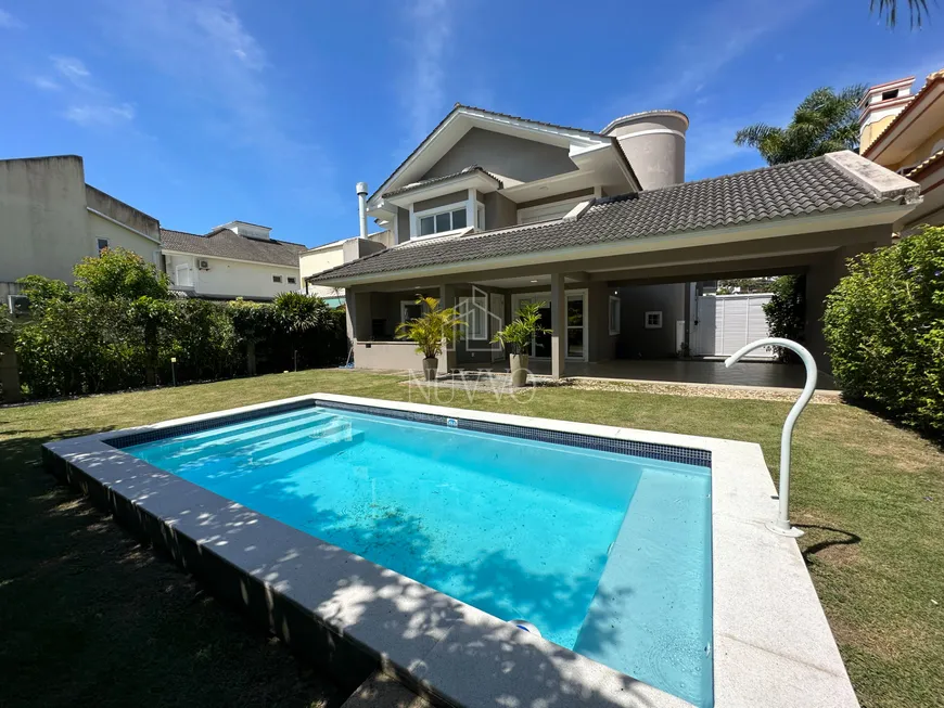 Foto 1 de Casa com 5 Quartos para alugar, 450m² em Jurerê Internacional, Florianópolis