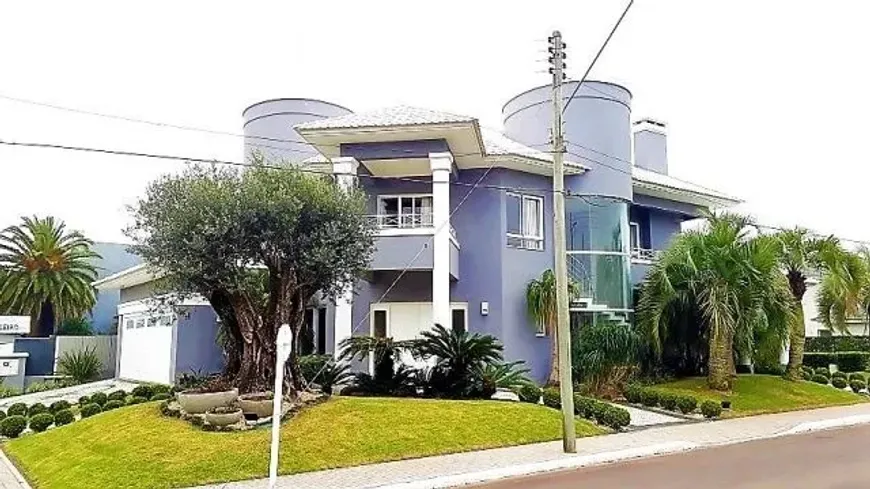 Foto 1 de Casa de Condomínio com 4 Quartos à venda, 350m² em Condominio Velas da Marina, Capão da Canoa
