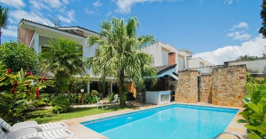 Foto 1 de Casa de Condomínio com 4 Quartos à venda, 388m² em Riviera de São Lourenço, Bertioga