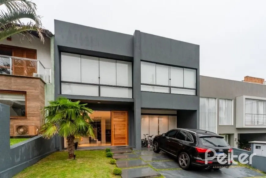 Foto 1 de Casa de Condomínio com 3 Quartos à venda, 250m² em Hípica, Porto Alegre