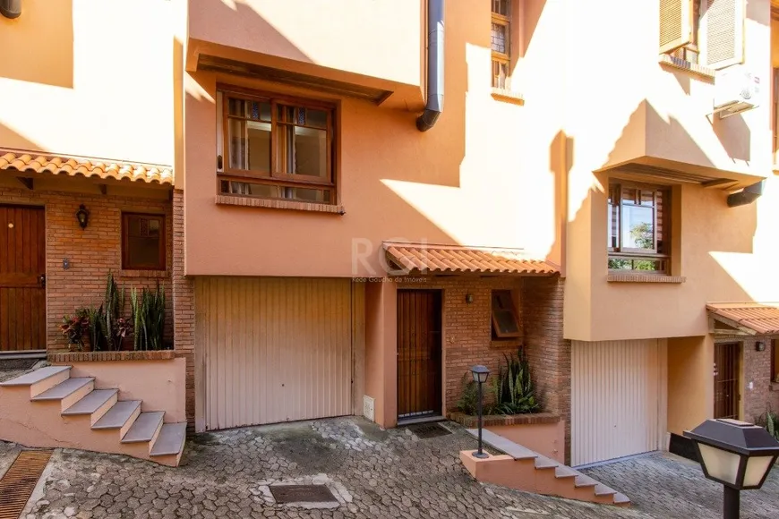 Foto 1 de Casa de Condomínio com 3 Quartos à venda, 149m² em Espiríto Santo, Porto Alegre
