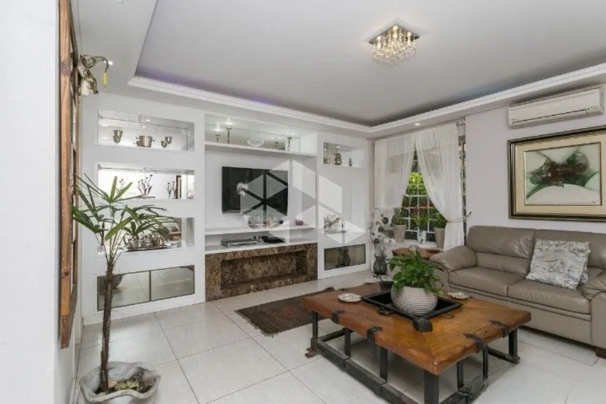 Foto 1 de Casa de Condomínio com 4 Quartos à venda, 180m² em Tristeza, Porto Alegre