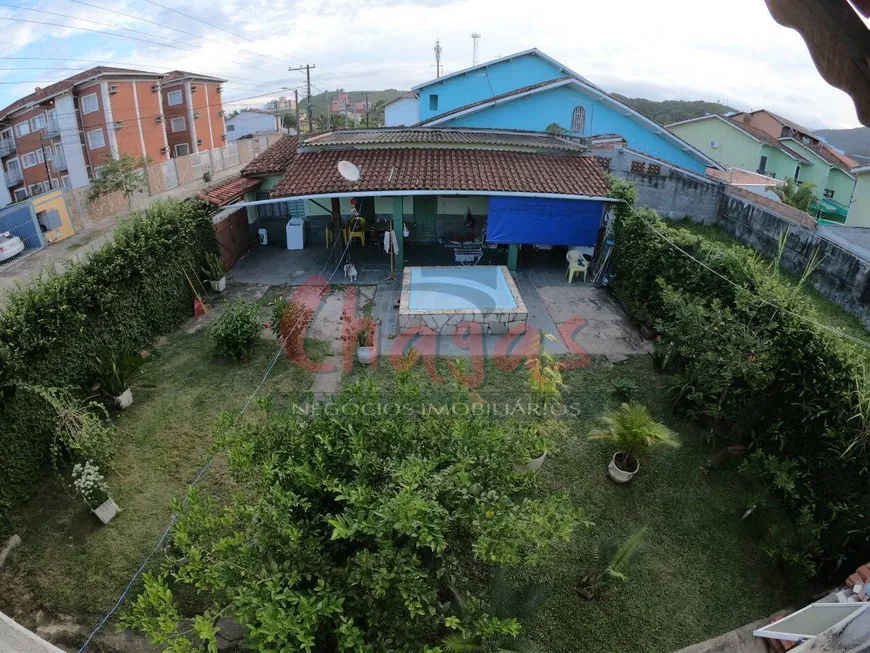 Foto 1 de Casa com 2 Quartos à venda, 386m² em Martim de Sa, Caraguatatuba