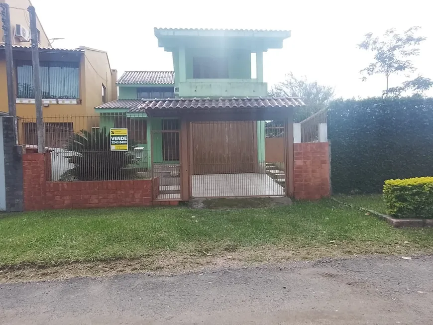 Foto 1 de Casa com 3 Quartos à venda, 185m² em Vila Nova, Porto Alegre