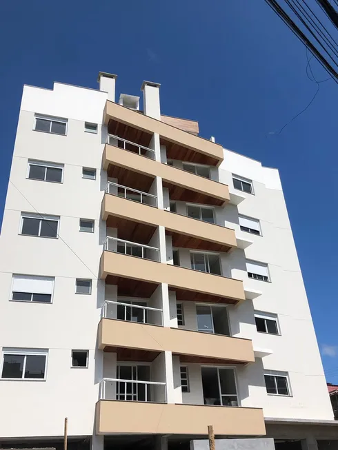 Foto 1 de Apartamento com 2 Quartos à venda, 61m² em Itacorubi, Florianópolis