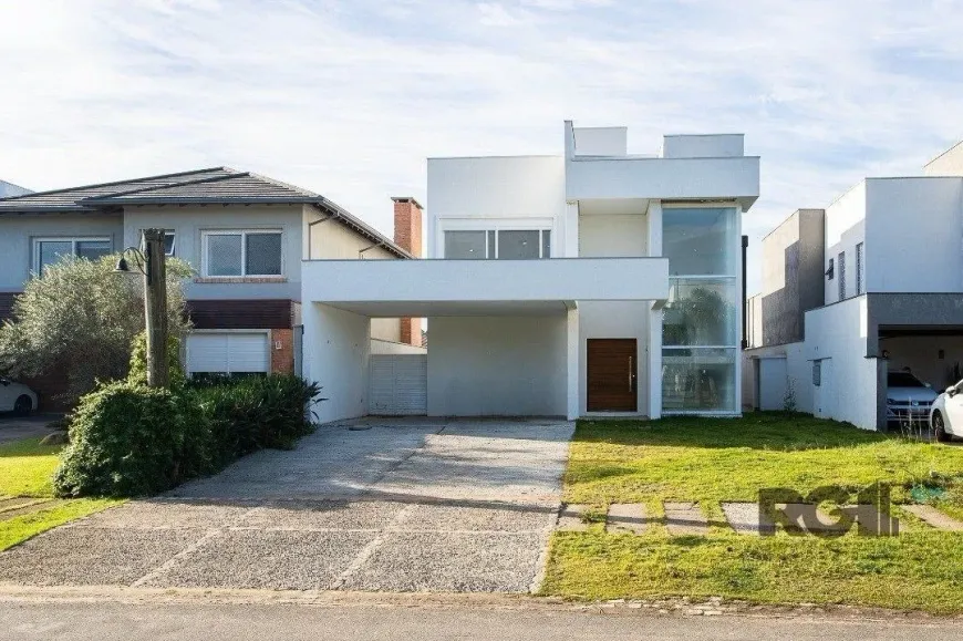 Foto 1 de Casa de Condomínio com 3 Quartos à venda, 296m² em Belém Novo, Porto Alegre