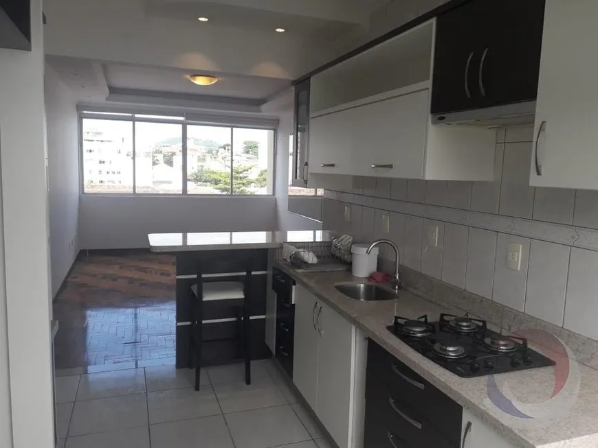 Foto 1 de Apartamento com 2 Quartos à venda, 63m² em Coqueiros, Florianópolis