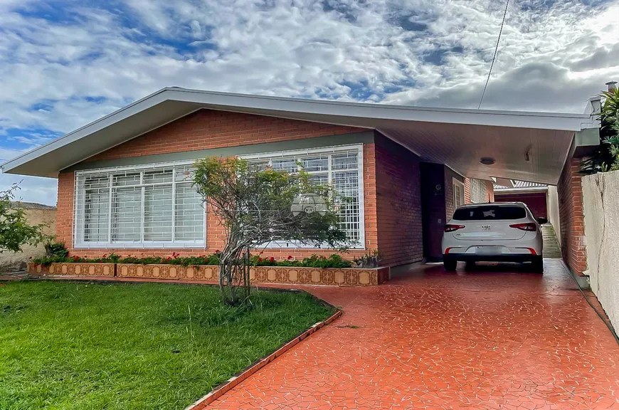 Foto 1 de Casa com 4 Quartos à venda, 238m² em Bacacheri, Curitiba