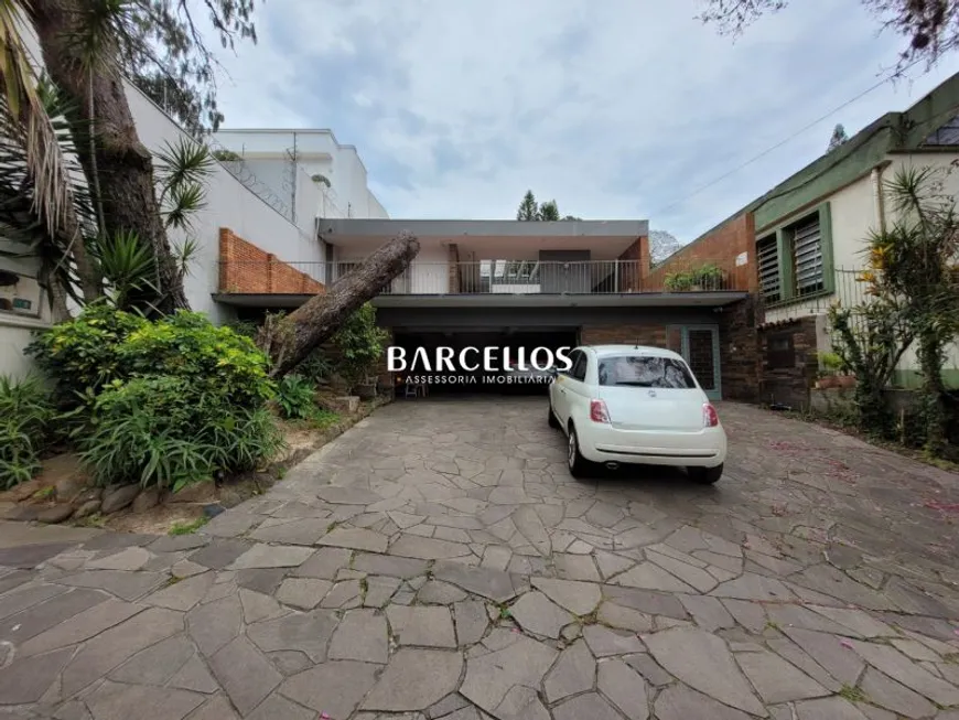 Foto 1 de Casa com 3 Quartos à venda, 338m² em Três Figueiras, Porto Alegre