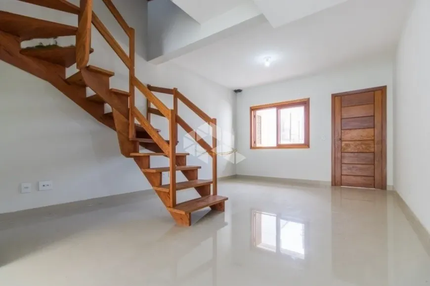 Foto 1 de Casa com 3 Quartos à venda, 140m² em Guarujá, Porto Alegre