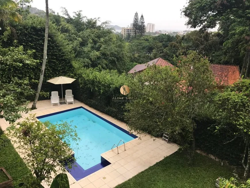 Foto 1 de Casa com 4 Quartos à venda, 350m² em Barra da Tijuca, Rio de Janeiro