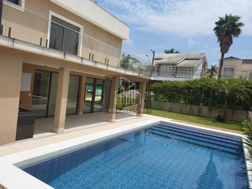 Foto 1 de Casa com 4 Quartos à venda, 430m² em Alphaville Residencial Dois, Barueri