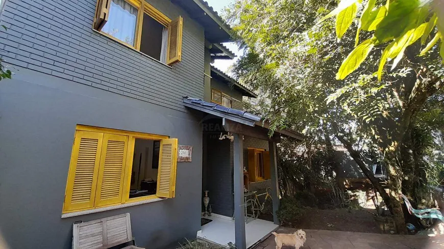 Foto 1 de Casa de Condomínio com 4 Quartos à venda, 300m² em Condominio Cantegril, Viamão