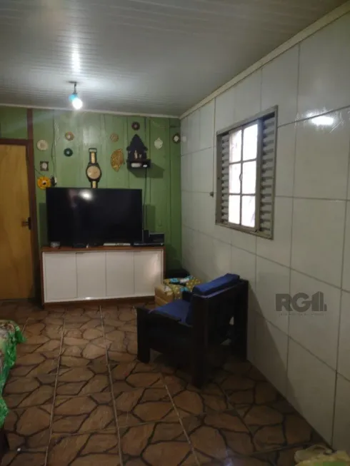 Foto 1 de Casa com 3 Quartos à venda, 69m² em Camaquã, Porto Alegre