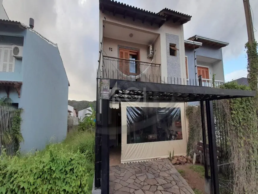Foto 1 de Sobrado com 3 Quartos à venda, 171m² em Aberta dos Morros, Porto Alegre