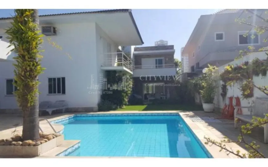 Foto 1 de Casa de Condomínio com 4 Quartos à venda, 600m² em Barra da Tijuca, Rio de Janeiro