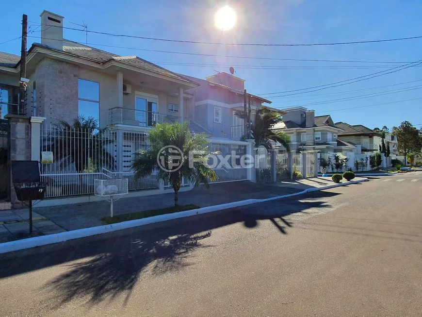 Foto 1 de Casa com 4 Quartos à venda, 234m² em Marechal Rondon, Canoas