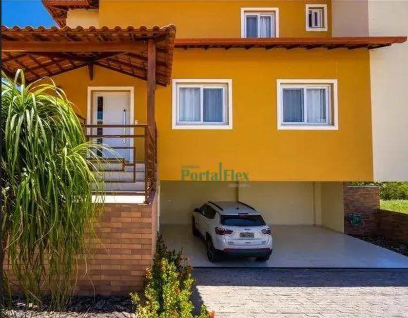 Foto 1 de Casa de Condomínio com 4 Quartos à venda, 300m² em Manguinhos, Serra