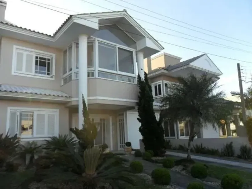 Foto 1 de Casa de Condomínio com 3 Quartos à venda, 195m² em Condominio Condado de Capao, Capão da Canoa