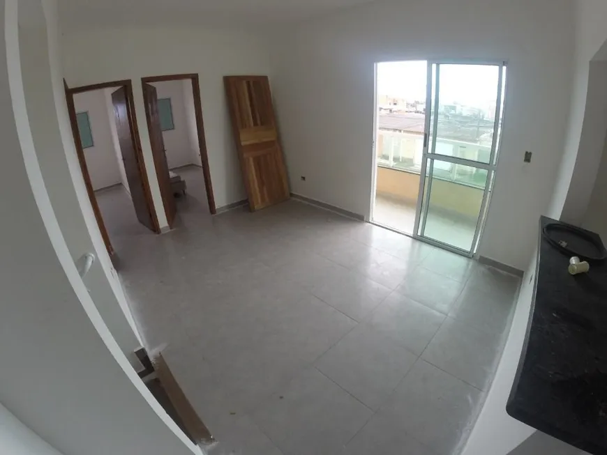 Foto 1 de Casa com 2 Quartos à venda, 65m² em Jardim Trevo, Praia Grande