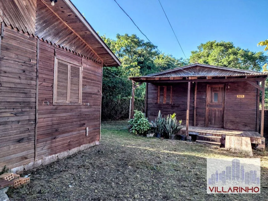 Foto 1 de Casa com 2 Quartos à venda, 100m² em Vila Nova, Porto Alegre