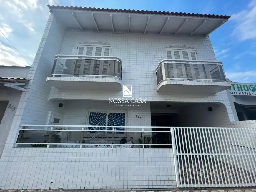 Foto 1 de Casa com 6 Quartos à venda, 500m² em Centro, Torres