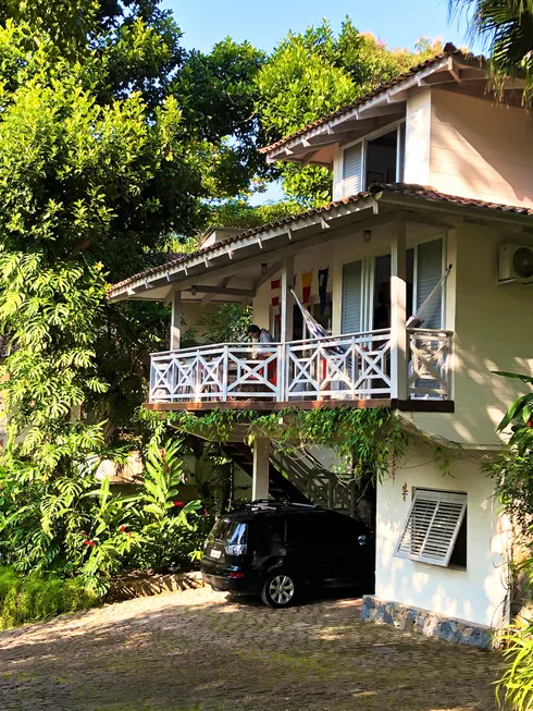 Foto 1 de Casa de Condomínio com 4 Quartos à venda, 200m² em Camburi, São Sebastião