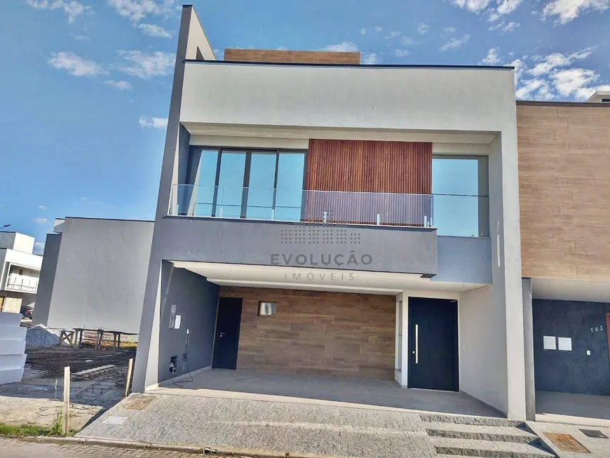 Foto 1 de Casa de Condomínio com 3 Quartos à venda, 200m² em Beira Rio, Biguaçu