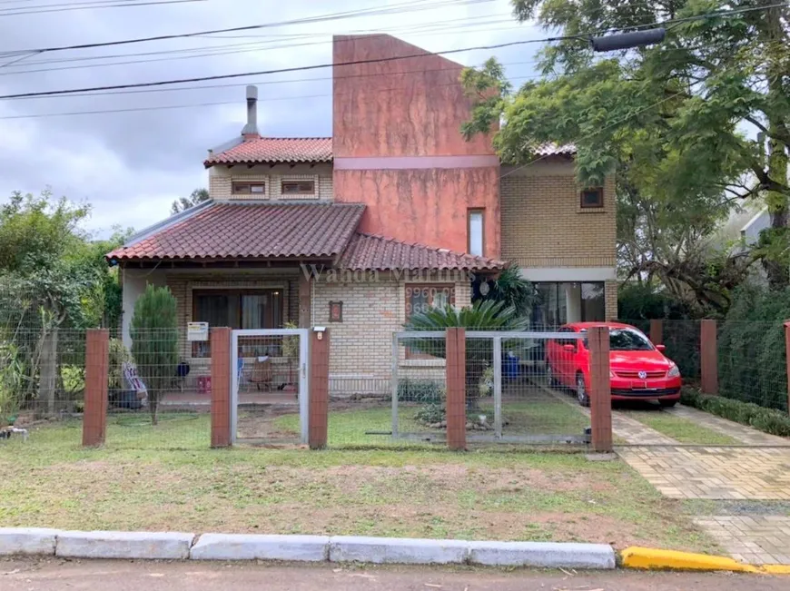 Foto 1 de Casa de Condomínio com 3 Quartos à venda, 385m² em Condominio Cantegril, Viamão