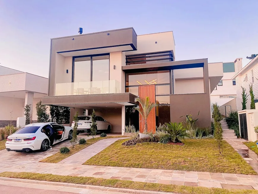 Foto 1 de Casa de Condomínio com 3 Quartos para alugar, 249m² em Vila Nova, Porto Alegre