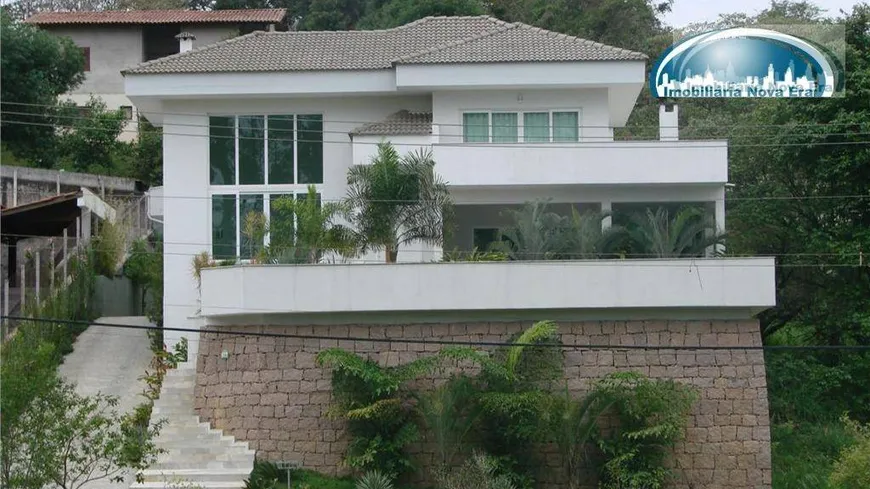 Foto 1 de Casa de Condomínio com 4 Quartos à venda, 400m² em Condominio Marambaia, Vinhedo