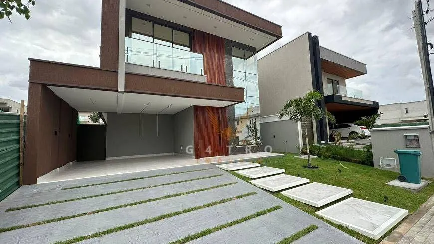 Foto 1 de Casa de Condomínio com 4 Quartos à venda, 330m² em Cidade Alpha, Eusébio