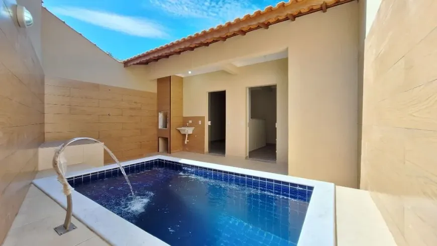 Foto 1 de Casa com 3 Quartos à venda, 88m² em Jardim Aguapeu, Mongaguá