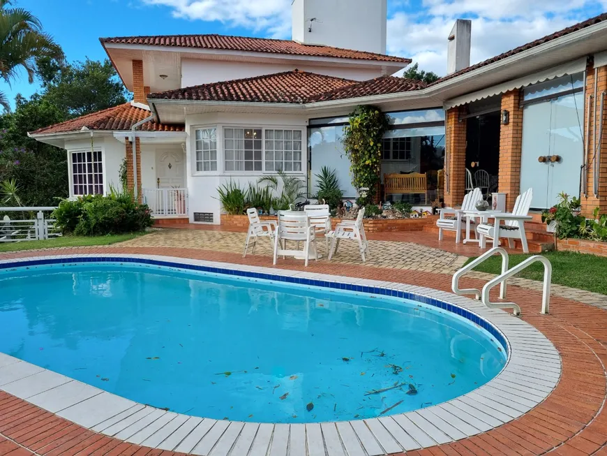 Foto 1 de Casa com 3 Quartos à venda, 384m² em Cacupé, Florianópolis