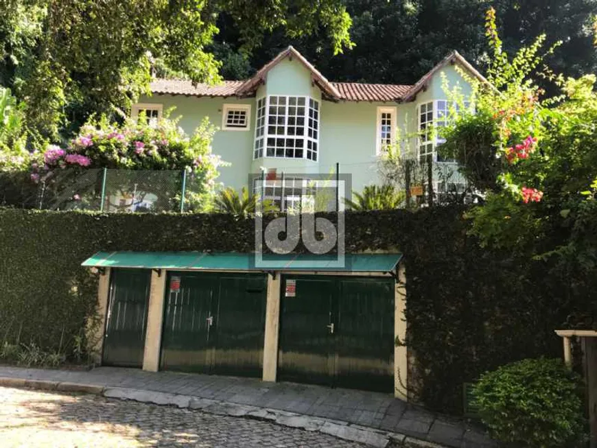 Foto 1 de Casa com 4 Quartos à venda, 250m² em Cosme Velho, Rio de Janeiro